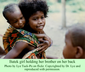 Batek girl and her brother